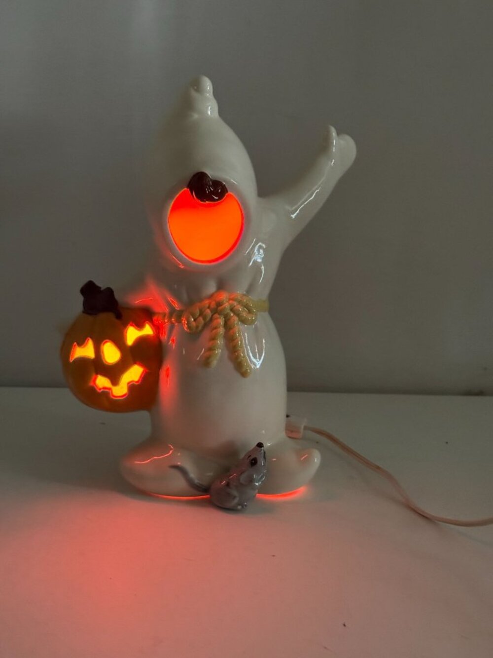Vintage Ceramic Halloween Lighted Ghost Holding a Jack-O-Lantern